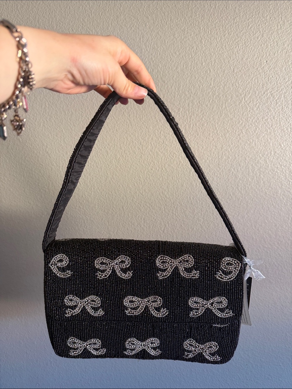Black Beaded Shoulder Bag with Silver Bow Accents
